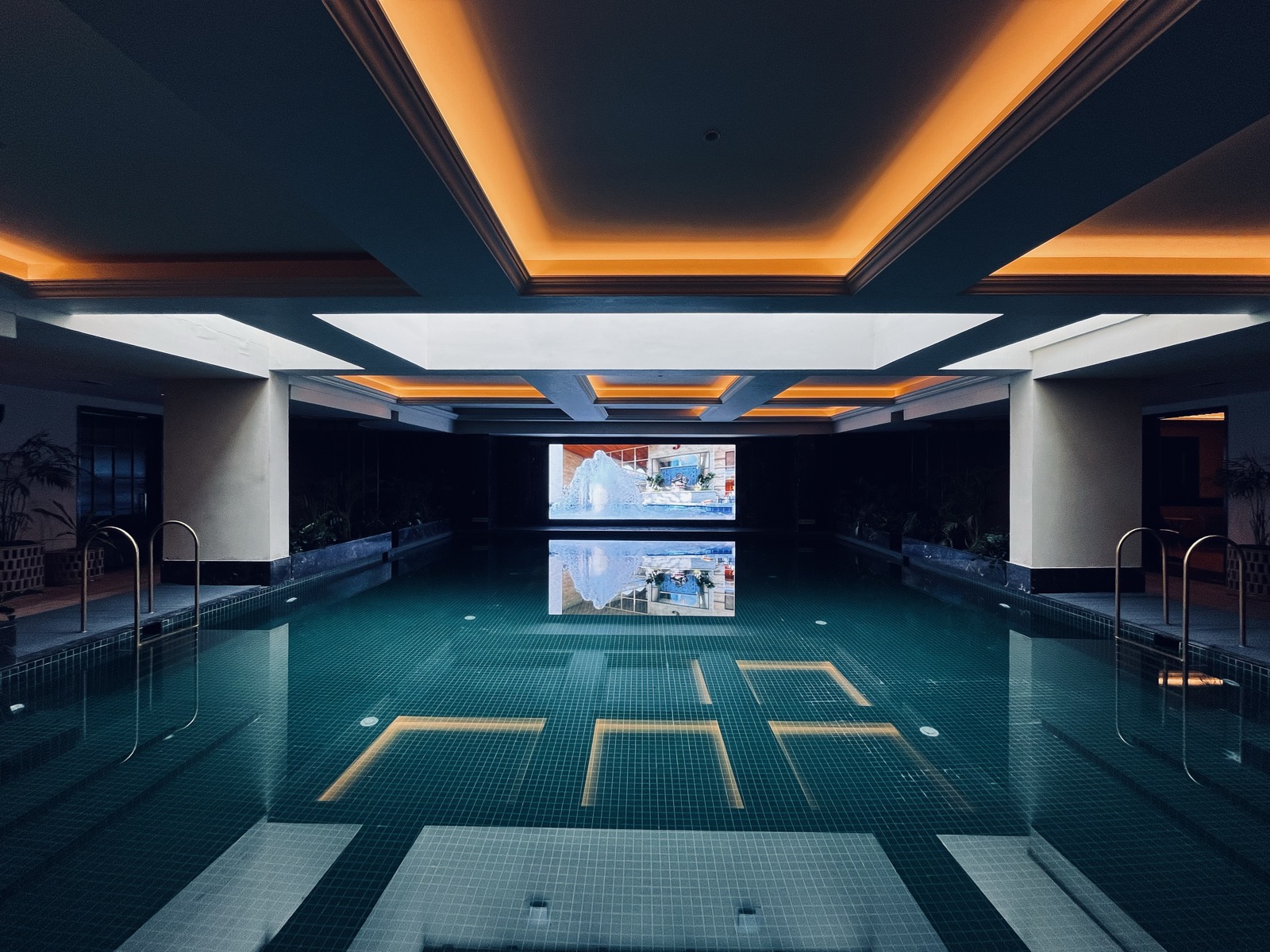 Frames & Details album cover — indoor pool at dusk